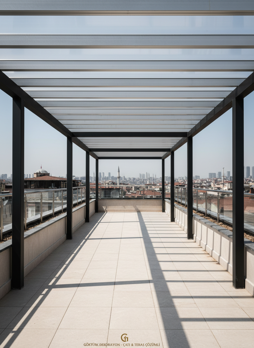 An expansive, sharp photographic view of a custom-built steel and aluminum pergola covering a rooftop terrace, with a combination of matte black steel columns and brushed silver aluminum beams forming a precise grid. The roof panels are translucent, allowing soft daylight to wash the space, creating layered linear shadows on the light beige tiled floor. Around the perimeter, low parapet walls and glimpses of distant Istanbul rooftops are subtly blurred. Captured from a slightly low angle to emphasize structural strength and engineering precision, with a balanced, rule-of-thirds composition. The mood is confident and professional, highlighting robust construction and high-quality materials suitable for Göktürk Dekorasyon’s roofing and terrace enclosure services.